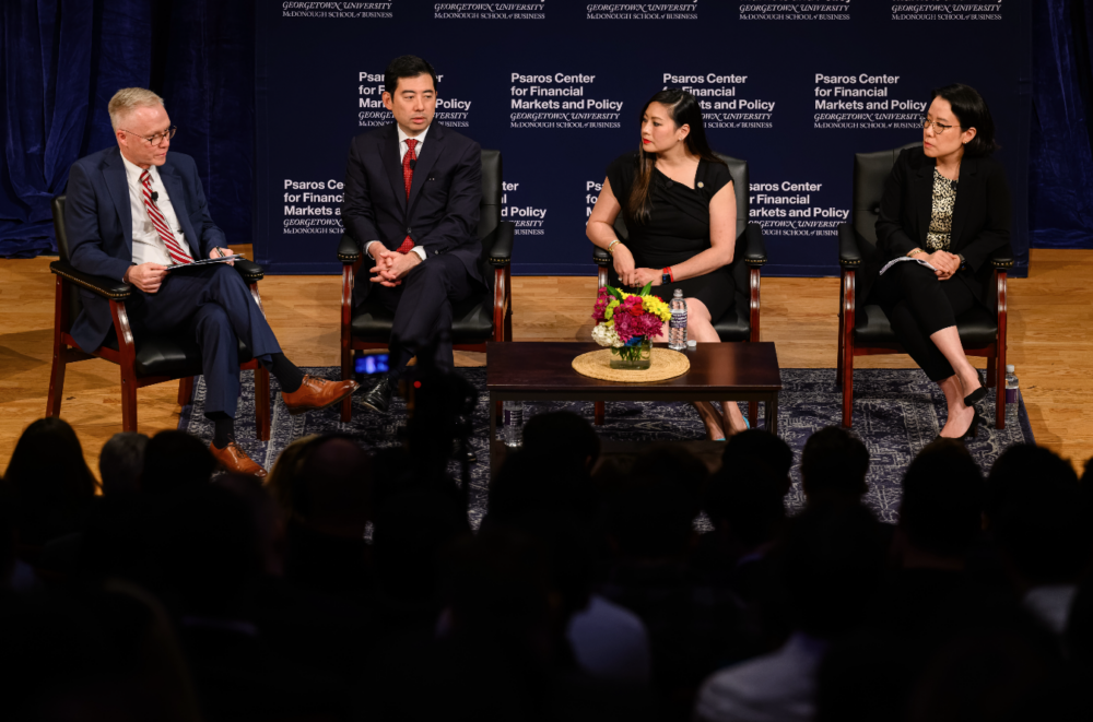 Four panelists on stage